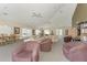 Spacious community room with comfortable seating and large windows at 120 Grand Oak Cir, Venice, FL 34292