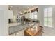 Modern kitchen with granite countertops and stainless steel appliances at 120 Grand Oak Cir, Venice, FL 34292