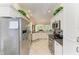 Kitchen with stainless steel appliances and granite counters at 120 Grand Oak Cir, Venice, FL 34292