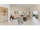 Bright living room features a comfy sofa and large windows at 120 Grand Oak Cir, Venice, FL 34292
