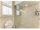 Large walk-in shower with glass enclosure and tiled walls at 120 Grand Oak Cir, Venice, FL 34292