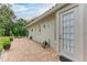 Brick paved walkway leads to private backyard at 120 Grand Oak Cir, Venice, FL 34292