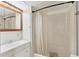 Bathroom with tub, shower, and updated vanity at 1211 45Th E Ave, Ellenton, FL 34222