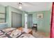 Bedroom with queen bed, closet, and access to laundry at 1211 45Th E Ave, Ellenton, FL 34222