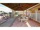 Relaxing patio area with covered seating and bike rack at 1211 45Th E Ave, Ellenton, FL 34222