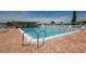 Inviting community pool with lounge chairs at 1211 45Th E Ave, Ellenton, FL 34222