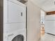 Stackable washer and dryer in a bright laundry room at 1211 45Th E Ave, Ellenton, FL 34222
