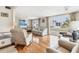 Spacious living room featuring hardwood floors and ample light at 1211 45Th E Ave, Ellenton, FL 34222