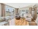 Living room with hardwood floors and sliding glass doors at 1211 45Th E Ave, Ellenton, FL 34222