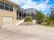 Large backyard with patio and partially-finished landscaping at 12317 Baypointe Ter, Cortez, FL 34215