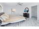 Primary bedroom with large walk-in closet and marble floors at 12317 Baypointe Ter, Cortez, FL 34215