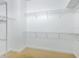 Large walk-in closet with wire shelving at 12317 Baypointe Ter, Cortez, FL 34215