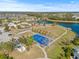 Community amenities including a basketball court and open green space at 12556 Ryegrass Loop, Parrish, FL 34219
