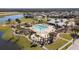 Community pool with playground and a large open green area at 12556 Ryegrass Loop, Parrish, FL 34219