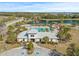 Resort-style community pool with a clubhouse and adjacent parking at 12556 Ryegrass Loop, Parrish, FL 34219