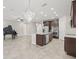 Modern kitchen with island, stainless steel appliances, and granite countertops at 12556 Ryegrass Loop, Parrish, FL 34219