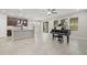 Open concept kitchen with island and modern appliances at 12556 Ryegrass Loop, Parrish, FL 34219