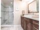 Spa-like bathroom with a walk-in shower and updated vanity at 145 Avenida Messina # 3, Sarasota, FL 34242