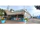 The Beach Club restaurant with a thatched roof at 145 Avenida Messina # 3, Sarasota, FL 34242