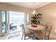 Charming dining area with access to a relaxing patio or screened-in porch at 145 Avenida Messina # 3, Sarasota, FL 34242