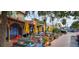 Outdoor restaurant patio with colorful tables at 145 Avenida Messina # 3, Sarasota, FL 34242