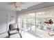 Peaceful sunroom overlooking lush landscaping at 145 Avenida Messina # 3, Sarasota, FL 34242