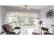 Comfortable sunroom with wicker furniture at 145 Avenida Messina # 3, Sarasota, FL 34242