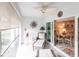 Relaxing sunroom, with access to dining area at 145 Avenida Messina # 3, Sarasota, FL 34242