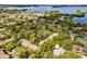 Aerial view of community, showcasing building layout and surrounding landscape at 1701 Pelican Cove Rd # 359, Sarasota, FL 34231