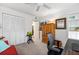 Home office with a built-in wooden cabinet and view of another room at 1701 Pelican Cove Rd # 359, Sarasota, FL 34231