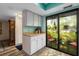 White kitchen cabinets and countertops, offering extra storage space at 1701 Pelican Cove Rd # 359, Sarasota, FL 34231