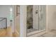 Elegant shower with marble tile and glass enclosure at 1774 10Th St, Sarasota, FL 34236