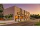 Modern townhouses with large windows and landscaped grounds at 1778 10Th St, Sarasota, FL 34236