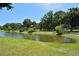 Serene pond with gazebo in lush parkland at 1778 10Th St, Sarasota, FL 34236