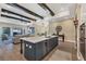 Open concept kitchen with an island and stainless steel appliances at 18096 Home Run Dr, Venice, FL 34293