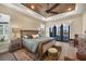 Main bedroom with wood floors and access to backyard at 18096 Home Run Dr, Venice, FL 34293