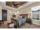 Main bedroom with wood floors and access to backyard at 18096 Home Run Dr, Venice, FL 34293