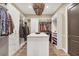 Large walk-in closet with ample shelving and drawers at 18096 Home Run Dr, Venice, FL 34293