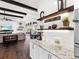 Coffee bar with granite countertop and built-in shelving at 19458 Beacon Park Pl, Lakewood Ranch, FL 34202