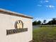 The Concession community entrance sign features classic design and landscaping at 19458 Beacon Park Pl, Lakewood Ranch, FL 34202