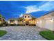 Beautiful home with a two-car garage and a welcoming entryway at 19458 Beacon Park Pl, Lakewood Ranch, FL 34202