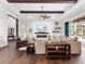 Open living room featuring hardwood floors, neutral colors, and a cozy seating area at 19458 Beacon Park Pl, Lakewood Ranch, FL 34202