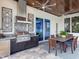 Outdoor kitchen with stainless steel appliances at 19458 Beacon Park Pl, Lakewood Ranch, FL 34202