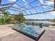 Spacious pool and spa with lake view at 19458 Beacon Park Pl, Lakewood Ranch, FL 34202