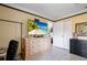 Bedroom with a dresser, large TV, and closet at 20255 Macon Ln, Port Charlotte, FL 33952