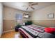Bedroom with king-size bed and ceiling fan at 20255 Macon Ln, Port Charlotte, FL 33952