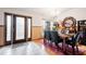 Bright dining room with a table, chairs and hardwood floors at 20255 Macon Ln, Port Charlotte, FL 33952