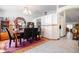 Open dining area with granite-topped table and access to kitchen at 20255 Macon Ln, Port Charlotte, FL 33952