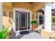 Inviting front porch with seating and decorative planters at 20255 Macon Ln, Port Charlotte, FL 33952