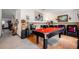 Game room with a pool table and comfortable seating at 20255 Macon Ln, Port Charlotte, FL 33952